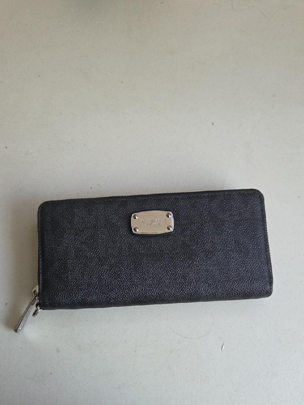 Michael Kors Black Pebbled Zip Wallet with Silver Plate